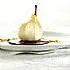 Peren met chocoladesaus en pistachenoten