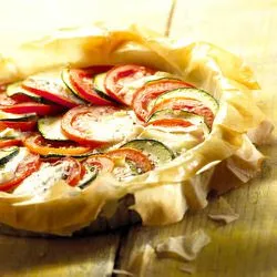 Tip: Snelle groentetaart met courgette en tomaat