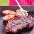 Gegrilde entrecote met mosterd en gegrilde tomaten