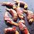 Gegrilde garnalen met rauwe ham