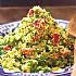 Couscous salade met paprika en groene kruiden