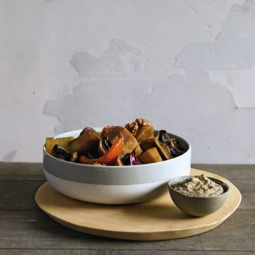 Tajine met champignons en walnoten