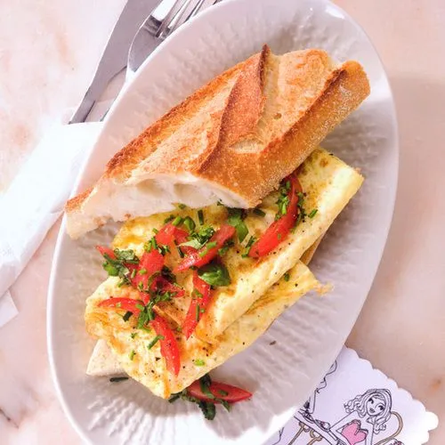 Omelet met bieslook, peterselie en rozemarijn