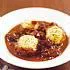 Coq au vin met kruidige knoedels