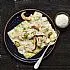 Ravioli met fromage frais en bieslook en romige boletensaus