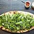 Pizza met peultjes, spinazie, rucola en ricotta