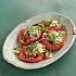 Paprika's gevuld met rijst, tomaten en tuinkruiden