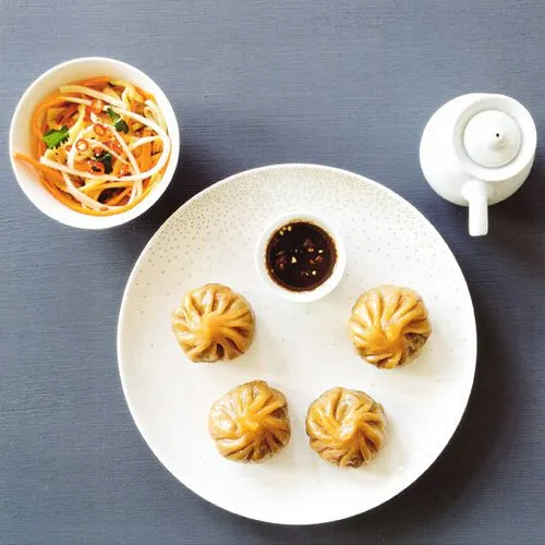 Dim sum met eendenborst en gekruide aubergine