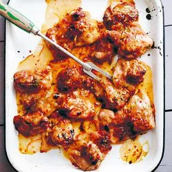 Tip: Gemarineerde kippendijen uit de oven