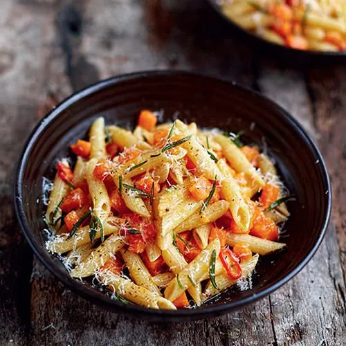 Penne met pompoen en pancetta