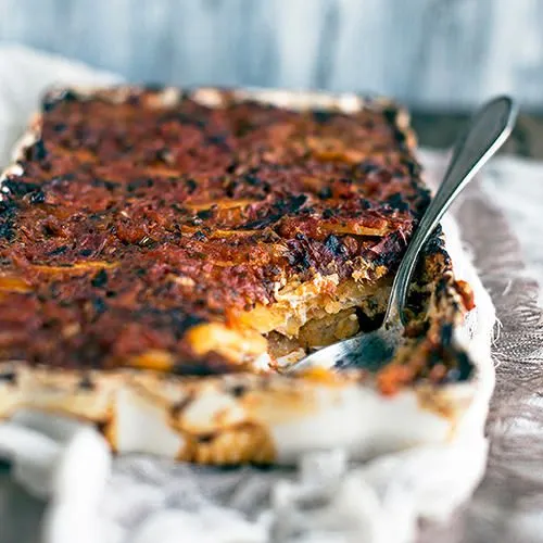 Aardappelgratin met geitenkaas en een groene salade