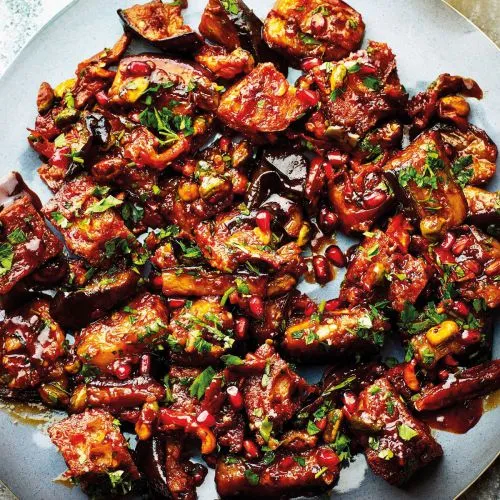 Auberginesalade met granaatappel en zongedroogde tomaten