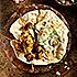 Kip tikka-spiesen met papadums