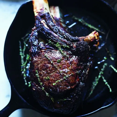 Côte de boeuf met gestoofde kool en bearnaisesaus