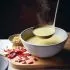 Recept Spruitjessoep met gesuikerde bacon en geroosterde hazelnoten