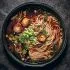 Shoyu ramen met gebakken koningsoesterzwam, noedels, tuinbonen