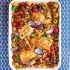 Zalm-tandoori met zoete aardappel, tomaten en rode ui