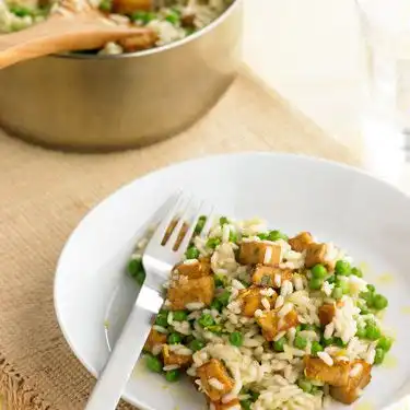 Romige citroen risotto met doperwtjes
