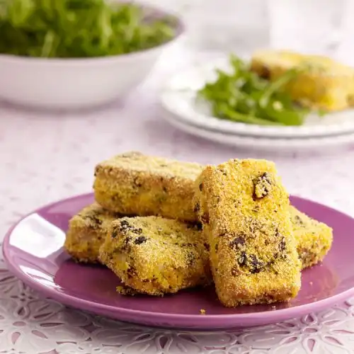 Tofu met een crust van polenta en zongedroogde tomaten