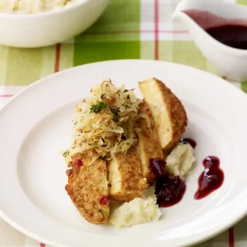 Zuurkool met knolselderijpuree en portsaus