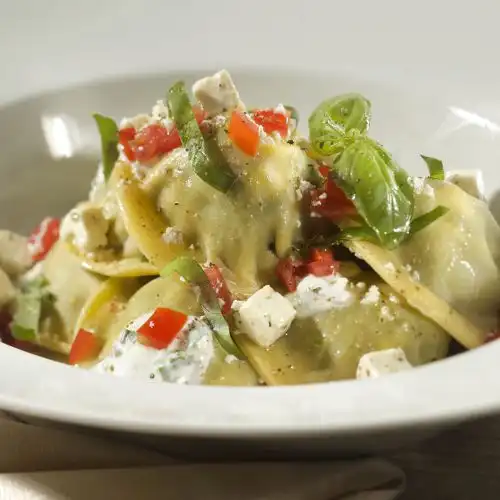 Ravioli met romige spinazie