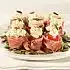 Kerstomaatjes met serranoham en pompoenpitten