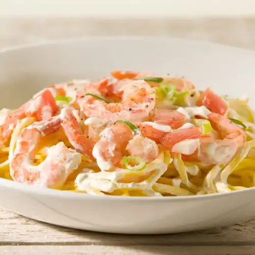 Spaghetti met garnalen en lente-uitjes