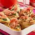 Crostini met rauwe ham en kruidige perensalsa