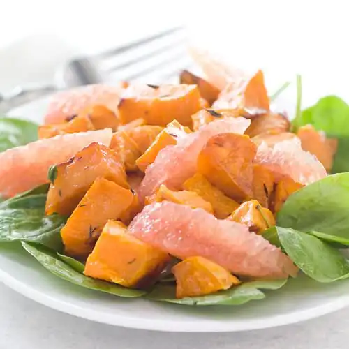 Geroosterde zoete aardappelen met grapefruitsalade
