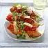 Bruschetta met tomaat, rucola en Parmezaanse kaas