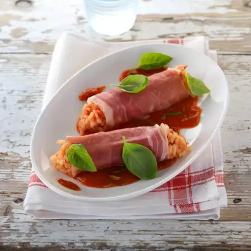 Hamrolletjes met tomatenrisotto