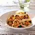 Tomatenrisotto met kastanjechampignons en courgette
