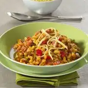 Macaroni met ham en Italiaanse groenten