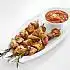 Pinchos van gemarineerde kip