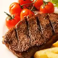 Biefstuk met sjalotjes en tomatensaus