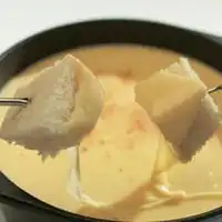 Kaasfondue met kruiden
