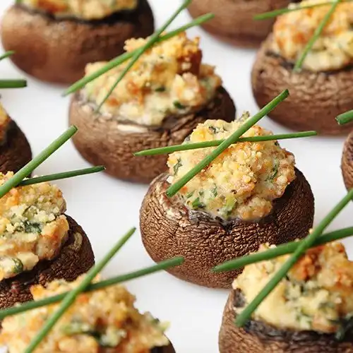 Champignons gevuld met slakken