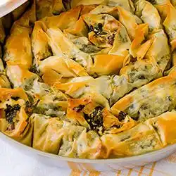 Tip: Hartige taart met courgette en feta