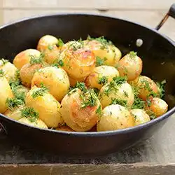 Tip: Aardappelen met ham en garnalen uit de wok