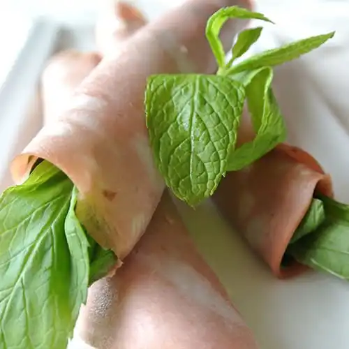 Hamrolletjes met spinazie