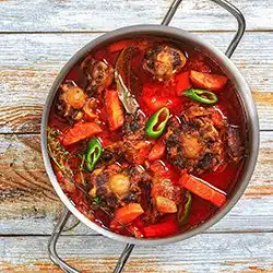 Tip: Ossenstaartbouillon met gegratineerde champignons