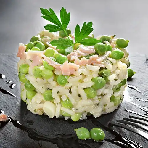 Saffraanrisotto met ham en doperwten